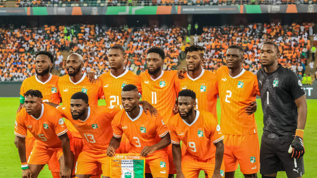 Players from the Ivory Coast pictured posing for a team photo before a game against Guinea-Bissau at the 2023 Africa Cup of Nations in January 2024